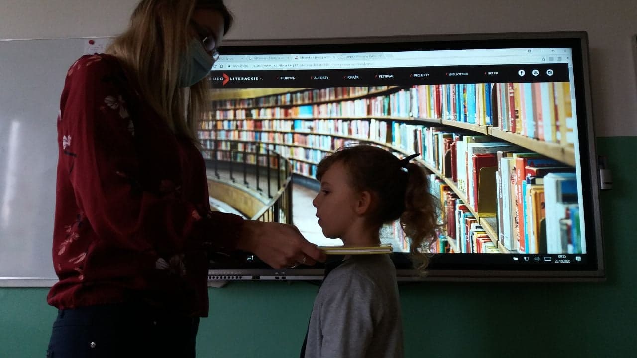 Pasowanie uczniów klasy I na czytelnika biblioteki szkolnej 